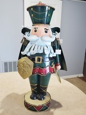 24" Christmas Metal Nutcracker Green Cloak, Sword  Shield - White Rolled Metal