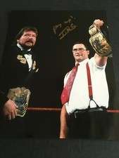 I.R.S.  (MIKE ROTUNDA) AUTOGRAPHED 8 X 10 PHOTO W/ MILLION DOLLAR MAN