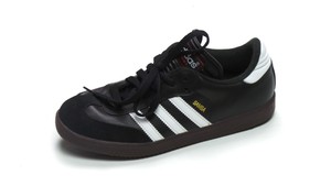 white shoes with three black stripes