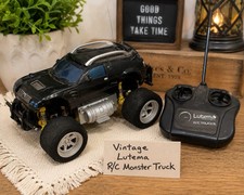 Monster Truck Lutema R/C de colección negro con control remoto coche juguete con controlador
