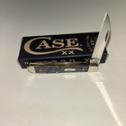 CASE XX #47491 BLUE CURLY OAK WOOD SMOOTH MINI TRAPPER SS — photo 1