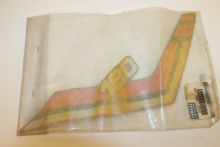NOS YAMAHA 1990 RT180A SIDE COVER EMBLEM 6 PART# 2TW-F1786-11-33