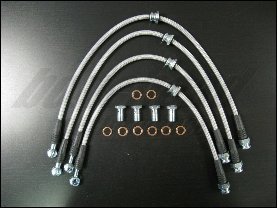 Líneas de freno trenzadas de acero inoxidable Techna-Fit 1993-1997 Ford Probe Foto 2 de 4