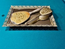 Vintage Four Piece Dresser Vanity Set. 2 Mirrors, 1 Brush