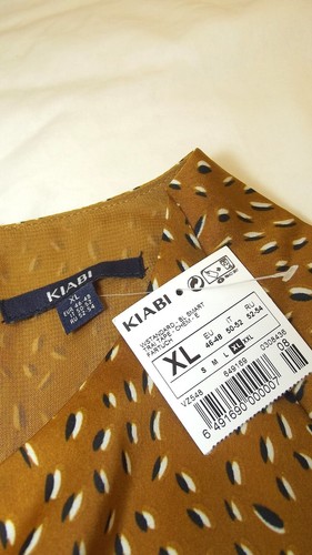 Kiabi Blusa Donna Effetto Raso Scollatura Rotonda Stmapa All Over Senza Maniche - Imagen 33 de 58