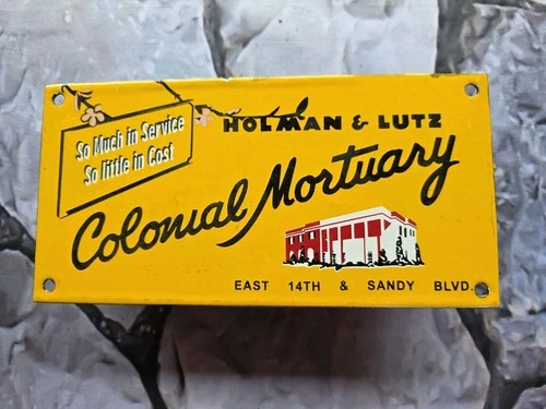 VINTAGE HOLMAN AND LUTZ COLONIAL MORTUARY PORCELAIN SIGN 10"×5".