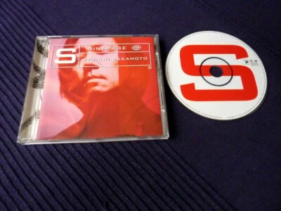 CD Ryuichi Sakamoto - Cinemage Last Emperor Litle Buddha David Sylvian Dj Spooky - Bild 1 von 3