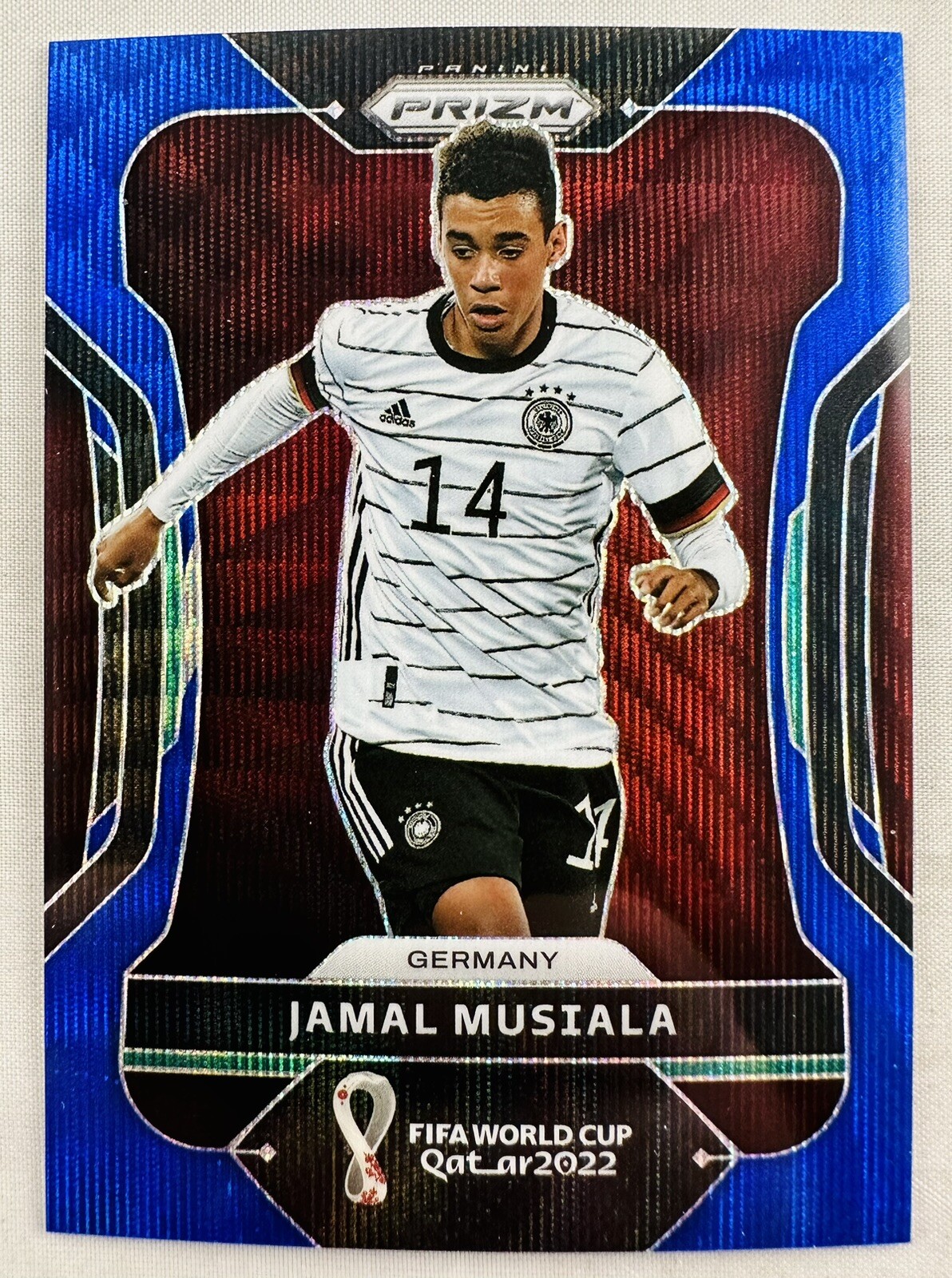 Jamal Musiala 2022 Prizm FIFA World Cup Blue Wave Prizm #/199 Germany