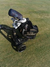 TITLEIST LTD EDITION MID SIZE CAMO GOLF BAG WITH MATCHING HEADCOVER AND TOWEL.