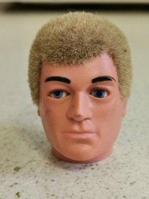 blonde action man
