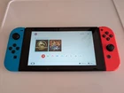 NINTENDO SWITCH V2 handheld console with Blue Red Joycons Great Condition