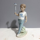 Lladro Figurine 7522 "Courage" Special Olympics Boy With Torch — photo 1
