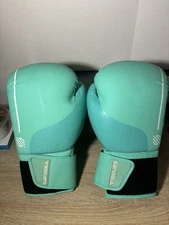 Sanabul Women's Easter Egg boxing glove 14oz   in the mint/ice blue color- Used