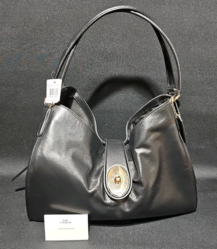 Borsa a tracolla Coach pelle liscia Carlyle nera F37637 stile media hobo nuova con etichetta
