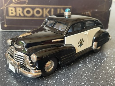 Auctions | Brooklin Models No.BRK23AA 1956 Ford Mainline 'Michigan State Police' Car - blue body, red roof light, pale grey interior - Mint in a Excellent