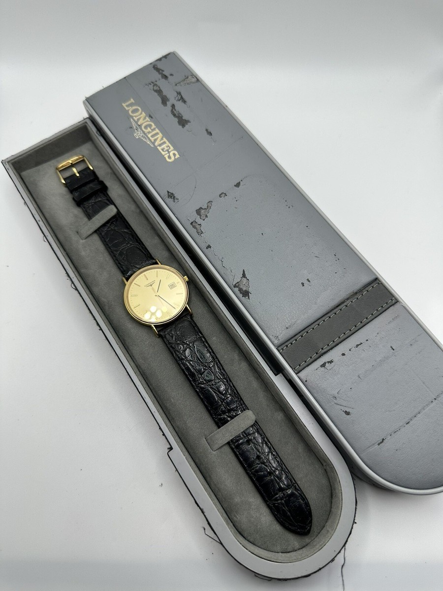 Longines L4.636.2 Watch Men's Round Quartz Gold Dial Date Longines L4.636.2 Watch Men's Round Quartz Gold Dial Date