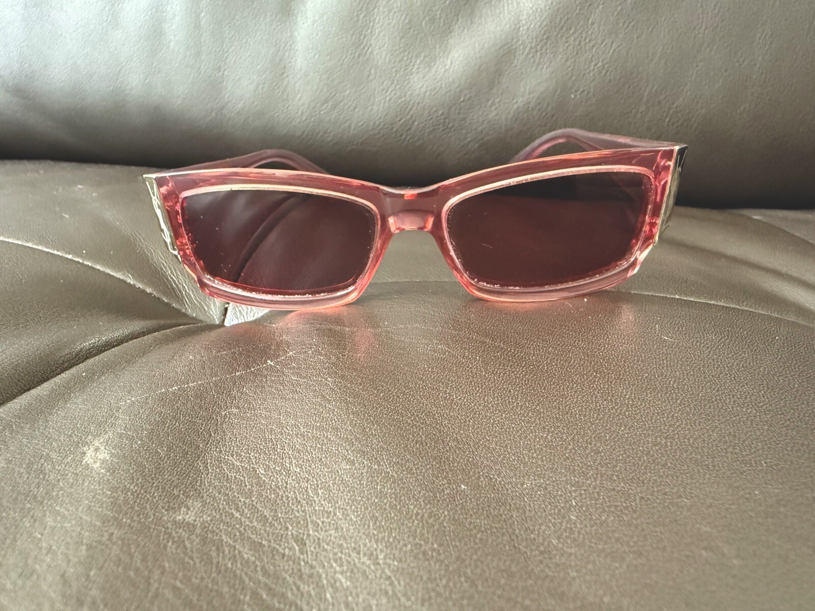 Occhiali da sole donna Yves Saint Laurent rosa trasparente Made in Italy