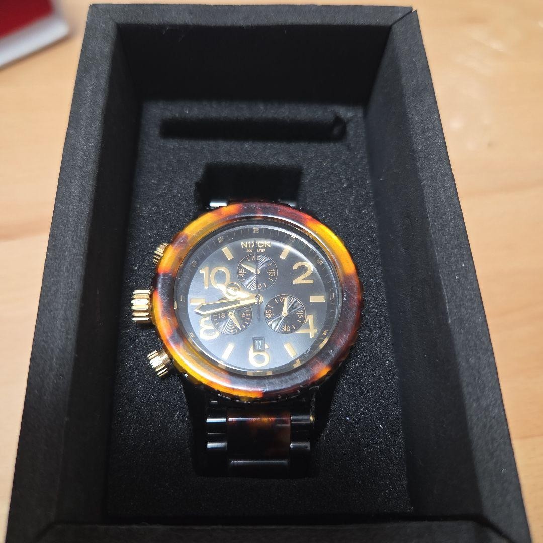 NIXON Watch THE42-20 Chronograph Black Tortoiseshell Men display picture 1