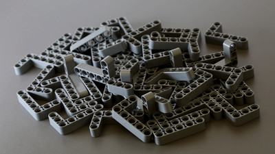 LEGO Technic: 50x Liftarm Modified Bent 3 x 5, Dark Bluish Gray