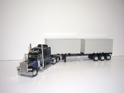 DCP FIRST GEAR 1/64 BLACK PETE 389 W/T 63'' SLEEPER & TRI-AXLE CONTAINER TRAILER