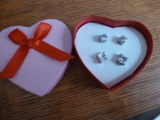 : New 2 prs. stud earrings, round, square, clear stones, in heart shaped box.