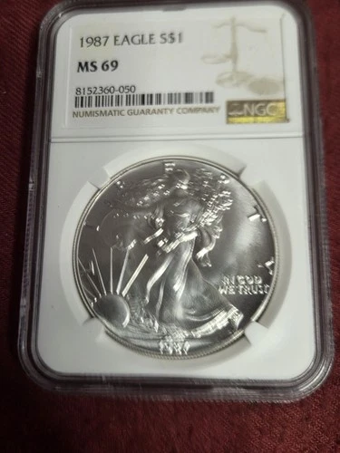 1987 AMERICAN SILVER EAGLE GRADED BY NGS MS69 BRILLIANT UNCIRCULATED CONDITION