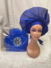 African Auto Gele With Matching Feather Hand fan.