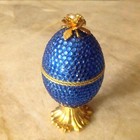 Real Egg Hand Carved and Decorated w Blue Crystals Hinged on gold Pedestal NIB