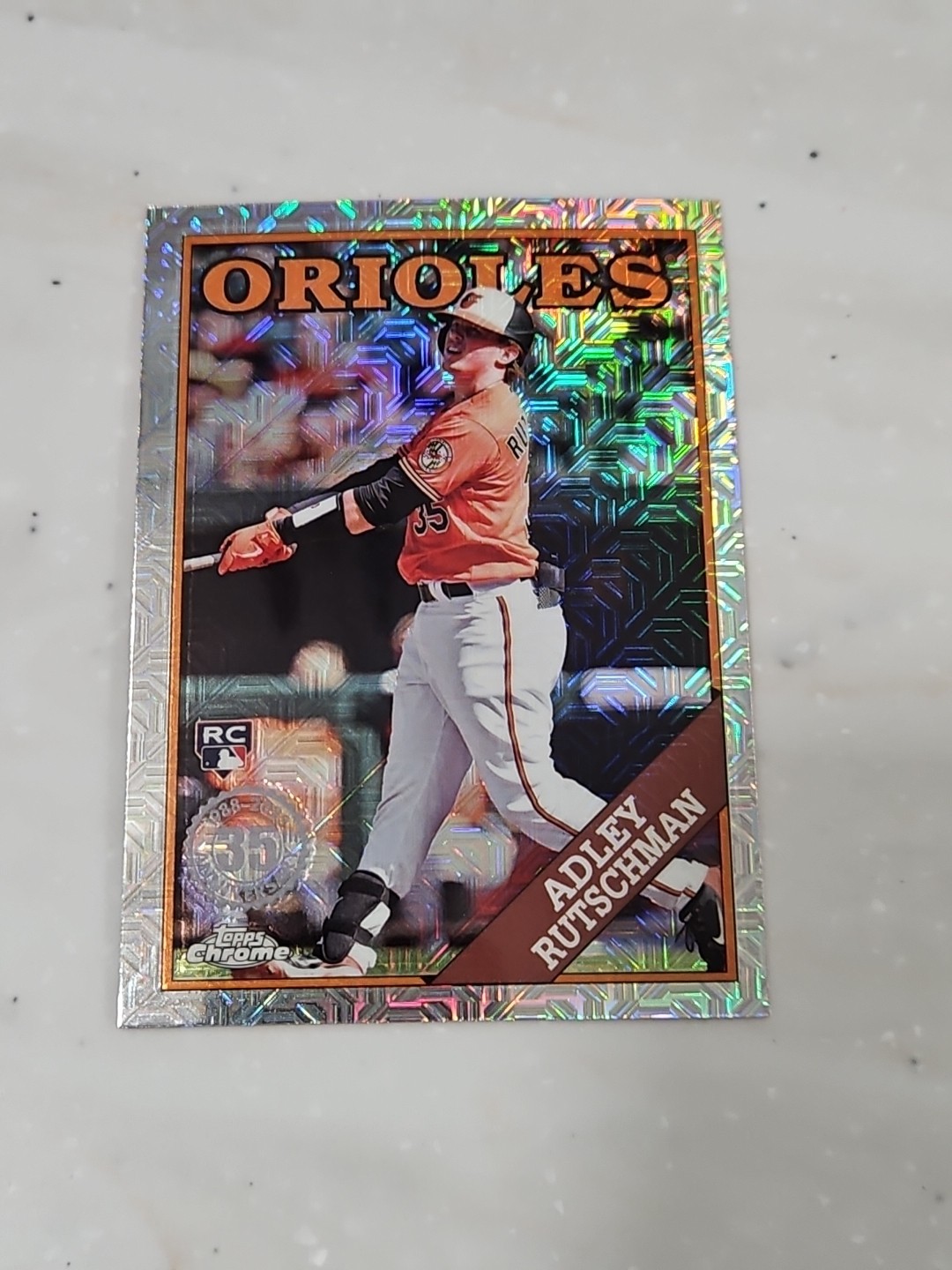 2023 Topps Series 1 Adley Rutschman Chrome Silver Pack Mojo Rookie Card. Orioles