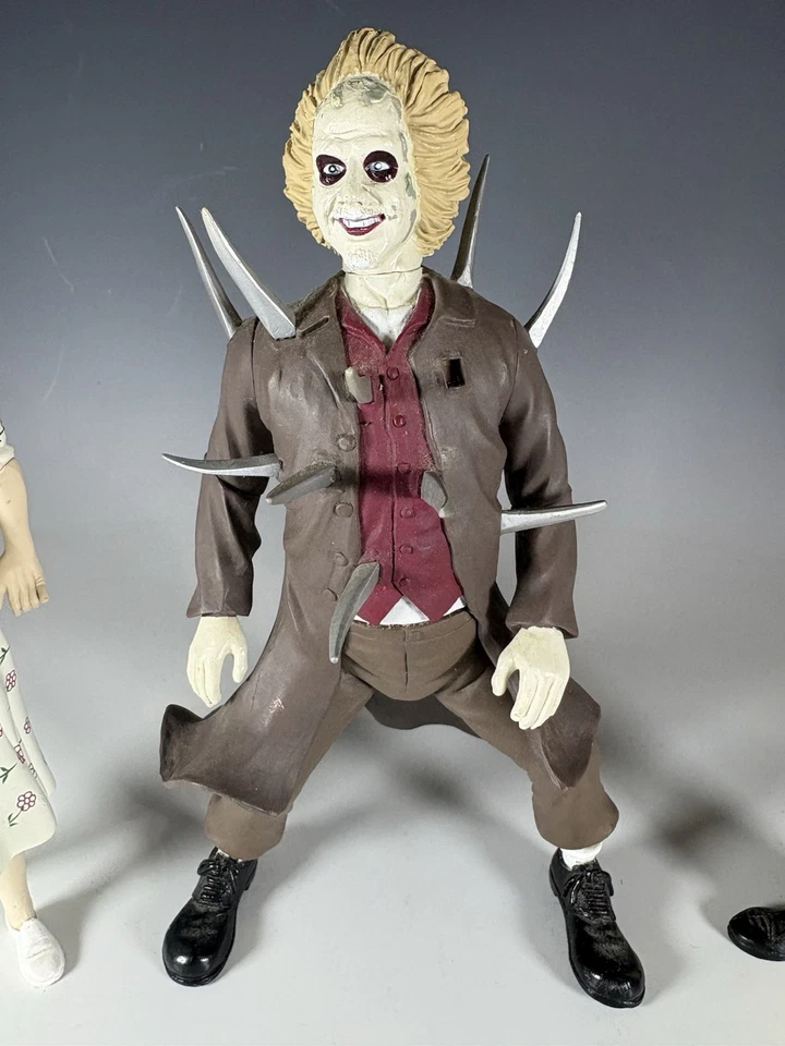 Neca Beetlejuice Adam Barbara Maitland cara estirada Barbara cara estirada Adam Foto 2 de 4