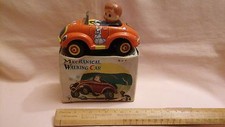 TINPLATE,MADE IN JAPAN IN THE LATE SIXTIES,A BOY IN A MECHANICAL WALKING CAR,VGC
