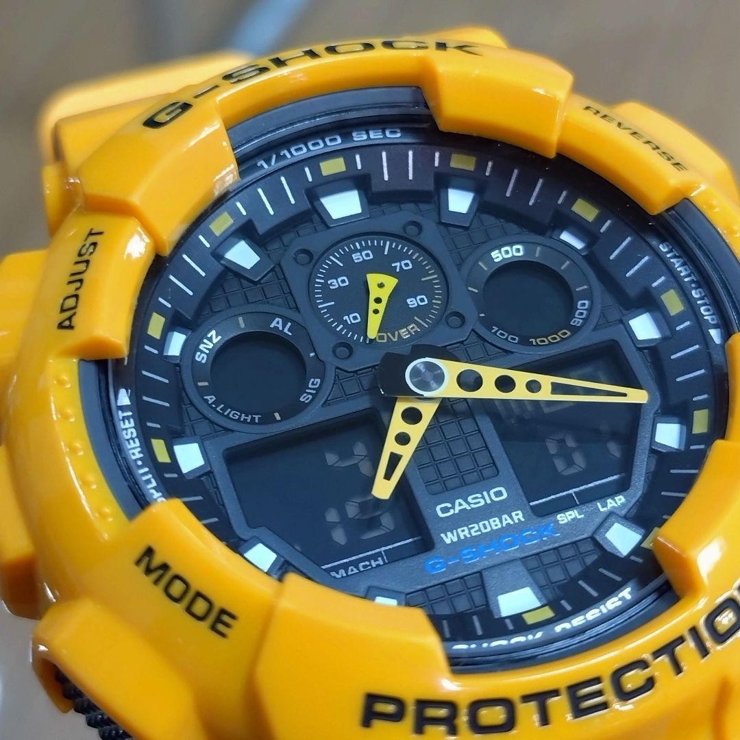 Casio G SHOCK GA 100A Yellow Digital Analog Hybrid Wristwatch