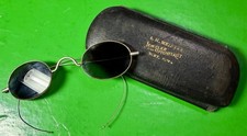 Late 19th c. smoked glass spectacles, wire temples original box gilt lettering