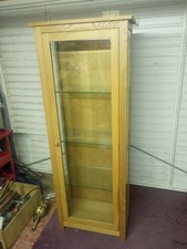oak display cabinet with glass doors