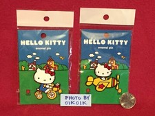 Pin esmaltado Sanrio Hello Kitty Cat AVIÓN BICICLETA mercado mundial bicicleta avión