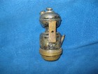 Two antique carbide lamps.  One is from the "City Gun Store" in Duluth Minnesota — photo 8