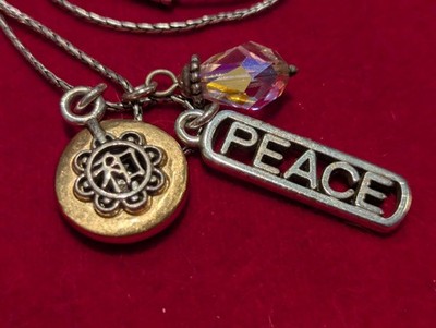 Brighton PEACE CHARMING silver, gold, and crystal Charm Necklace