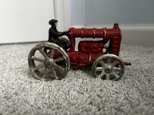 Vintage Cast Iron Red Farm Tractor Toy with Driver