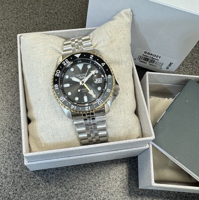 Seiko 5 Automatic GMT Steel Band Black Dial Gold Bezel Watch
