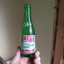 VERONA,PA LIFT BEVERAGES AIRPLANE PICTURE GREEN 1937 ACL SODA BOTTLE 7 OZ