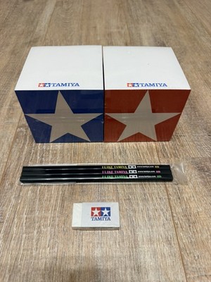 tamiya stationery kit:  2 memo blocks , 3 pencils , 1 eraser