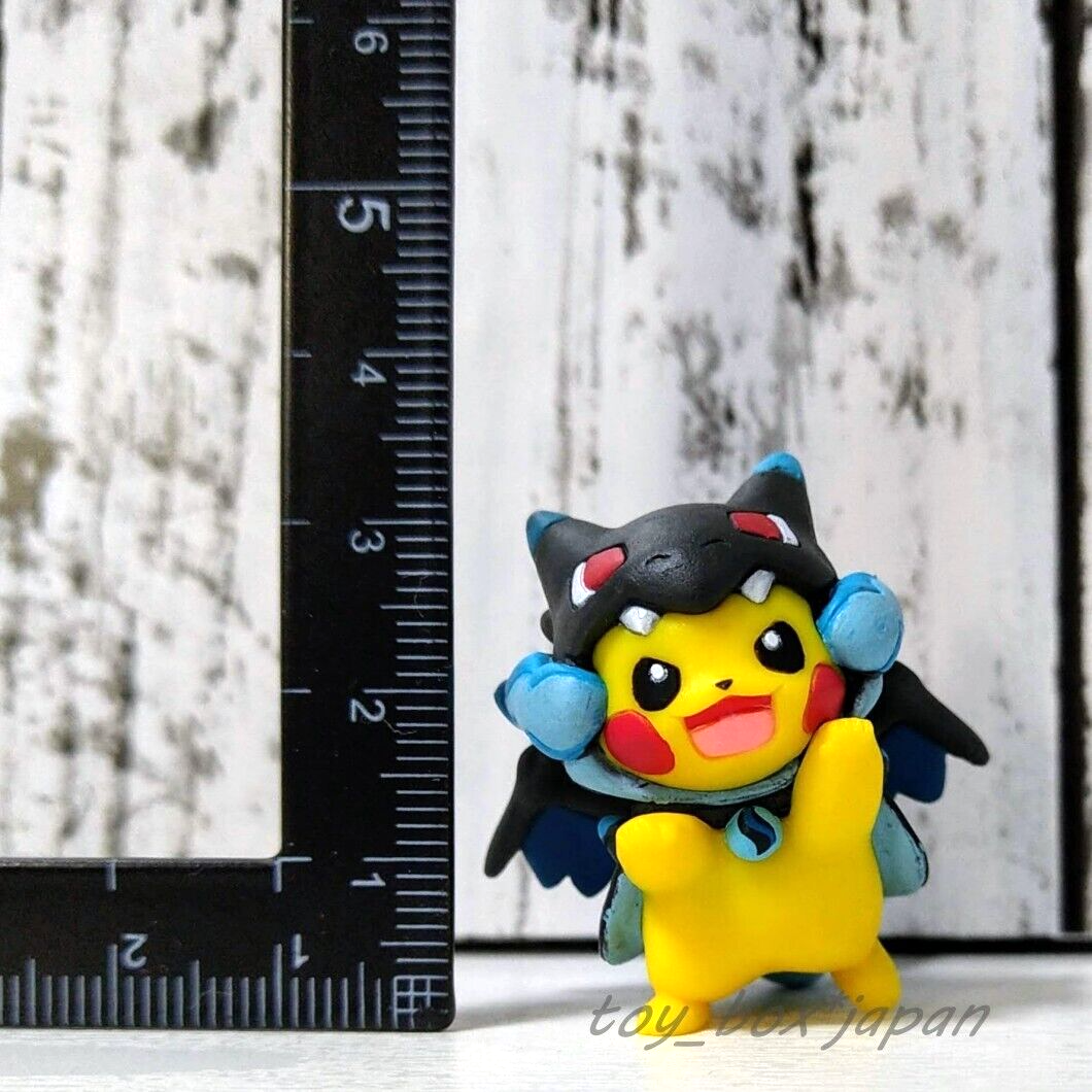 Pokemon Center Figure Pikachu wearing a Mega Charizard X Poncho