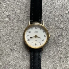 Timex Womens Watch Gold Tone Case W/White Dial and Black Leather Band Bin W