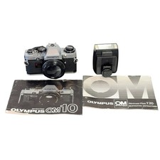 Olympus OM-10 35mm SLR Film Camera w/ Flash Manual For repair new battery READ