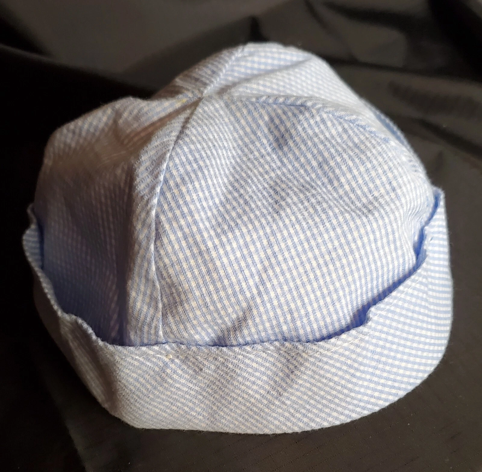 Hand sewn Blue and White Baby Boy's Hat. The hat has a simple, rounded shape wi
Opens in a new windo