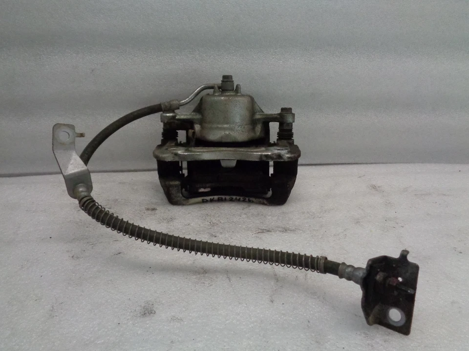 Pinza de freno delantera izquierda del lado del conductor Hyundai Accent 2012-2017 OEM DK812426 Foto 2 de 4