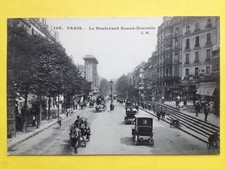 cpa PARIS Le Boulevard BONNE NOUVELLE Opticien FRODEAU Tricycle Calèche