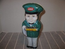 علبة معدنية Coca-Cola Man Green