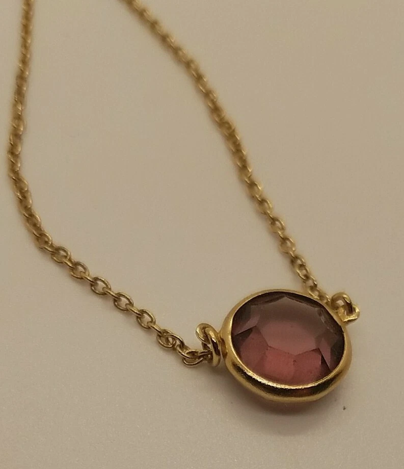 Avon Necklace With Amethyst Type Crystal. Gold tone. 16