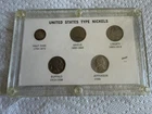 One high quality United States Nickel type set ( silver half - dime included)